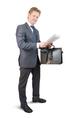 Businessman holding brief case clipart