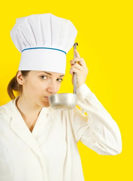 Chef tasting from ladle — Stock Photo, Image