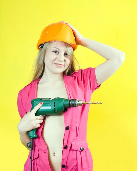 Sexy girl with drill — Stock Photo, Image