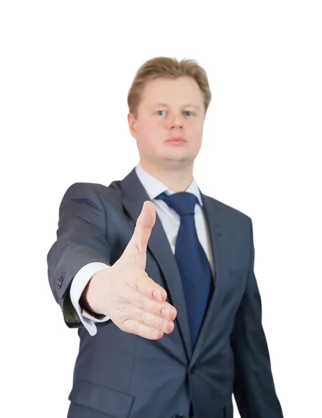 Empresário oferecendo um aperto de mão — Fotografia de Stock