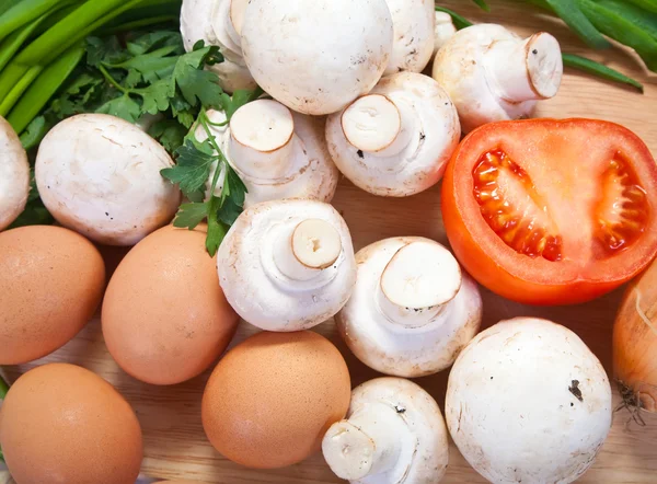 Champignon mushroom with eggs — Stock Photo, Image