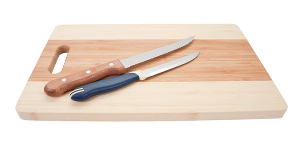 stock image Knifes over cutting board