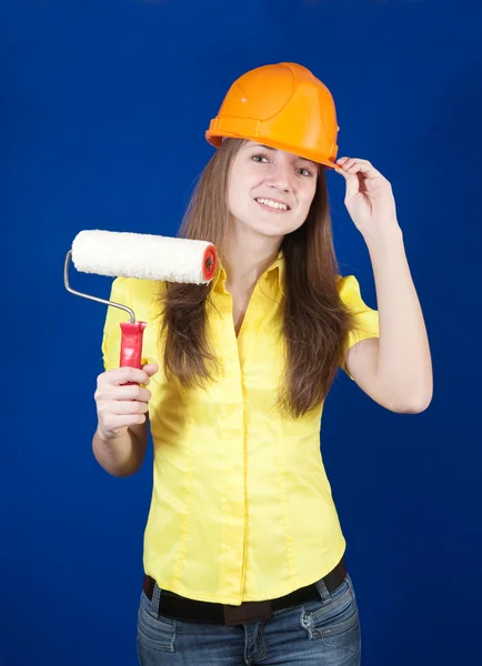 Girl with paint rollers — Stock Photo, Image