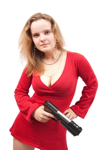 Meisje in een rode jurk met pistool — Stockfoto
