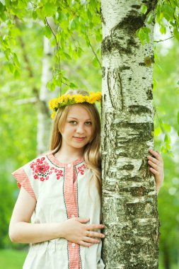 Girl in traditional clothes clipart