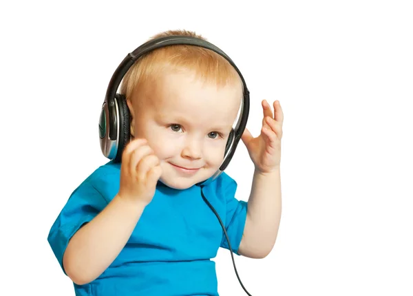 Menino ouvindo música — Fotografia de Stock