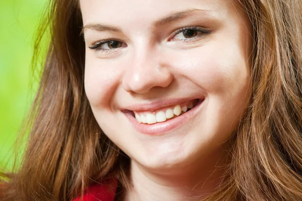 Vrouwelijke glimlachen gezicht — Stockfoto