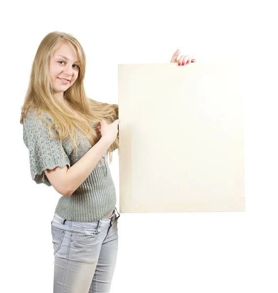 Dívka drží prázdné plátno — Stock fotografie