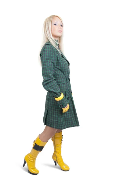 Menina de casaco verde no fundo branco — Fotografia de Stock