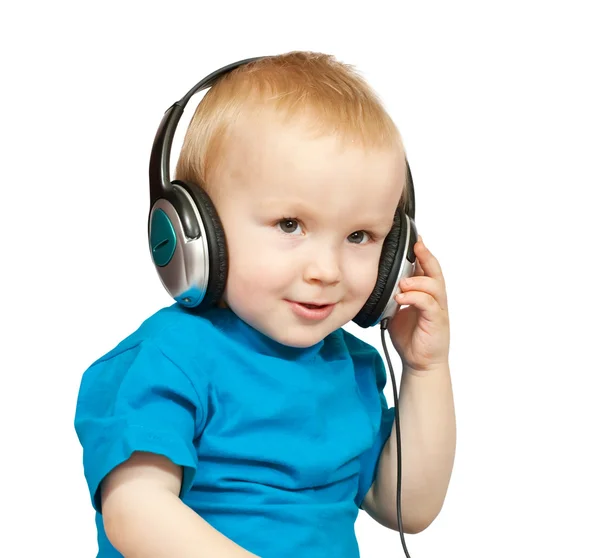 Pojke i blå tröja med hörlurar — Stockfoto