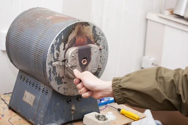Man is working with muffle furnace — Stock Photo, Image