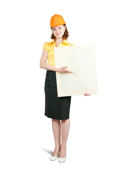 Businesswoman in hardhat holding banner — Stock Photo, Image
