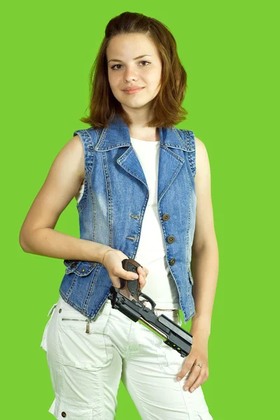 Meisje in het wit met pistool — Stockfoto