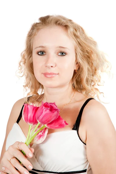 Flicka med tulpaner flower — Stockfoto