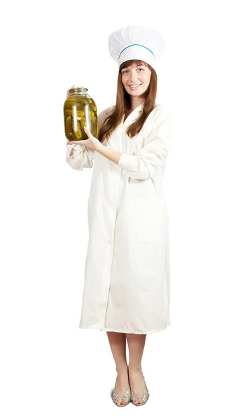 Cook girl holding tin of pickled cucumbers — Stock Photo, Image