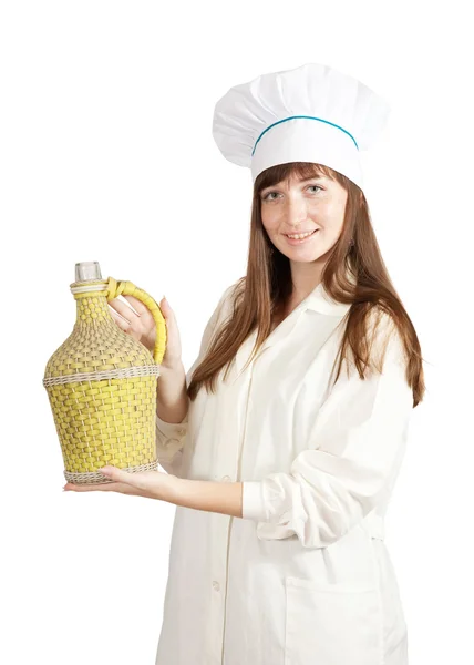 Cozinheiro segurando garrafa grande — Fotografia de Stock