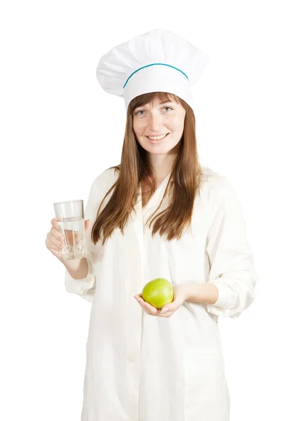 Шеф-повар держит яблоки и траву воды — стоковое фото