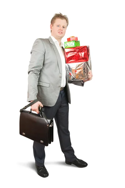 Geschäftsmann mit Geschenkschachteln — Stockfoto