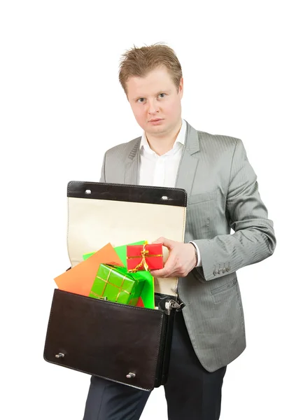 Man is taking out present box from case — Stock Photo, Image