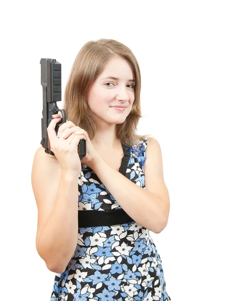 Hezká dívka v modrých šatech s pistolí — Stock fotografie