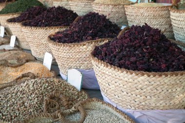 Hibiscus tea and beans in baskets clipart