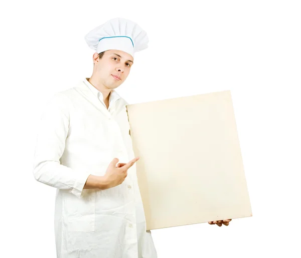 Cook man pointing at blank canvas — Stock Photo, Image