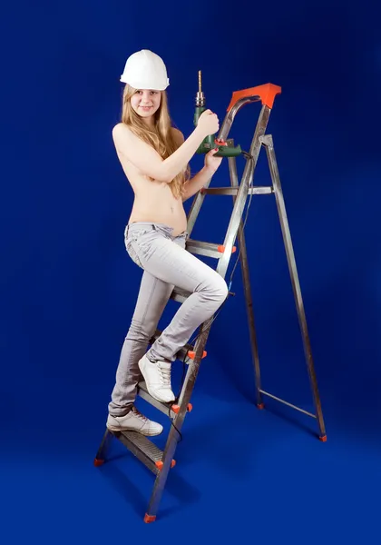 Topless woman with drill — Stock Photo, Image