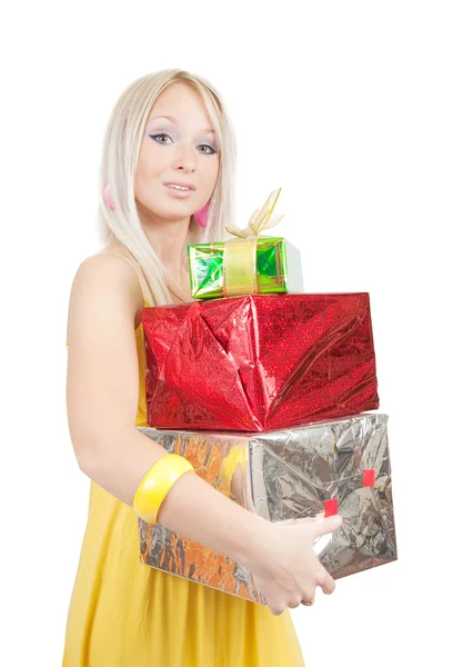 Menina com caixas de presente coloridas sobre branco — Fotografia de Stock
