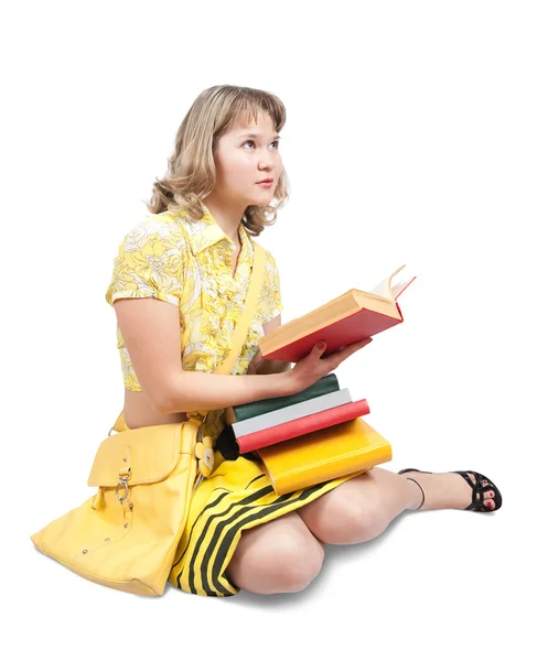 Vrouwelijke student lezen boek over Wit — Stockfoto