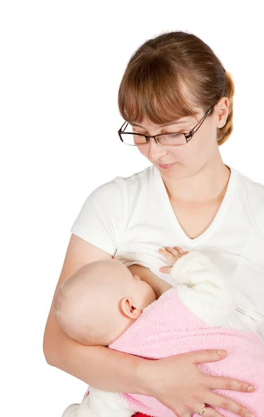 Máma se dívá na dítě sání prsu — Stock fotografie