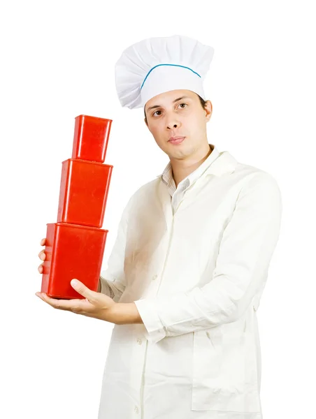 Homem cozinheiro com pacotes vermelhos — Fotografia de Stock