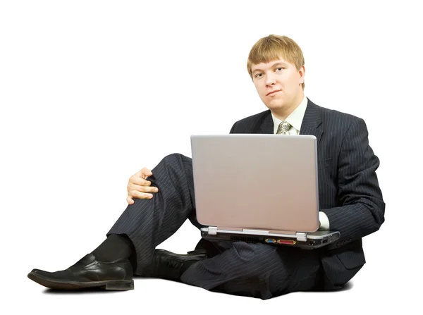 Handsome businessman with laptop — Stock Photo, Image