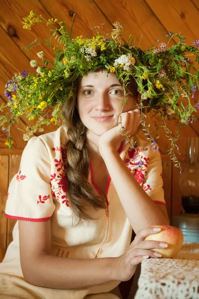Girl in flowers chaplet — Stock Photo, Image