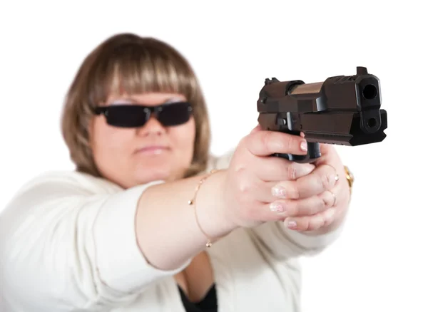 Dívka zaměřené černá pistole — Stock fotografie