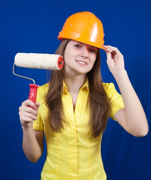 Girl with paint rollers — Stock Photo, Image