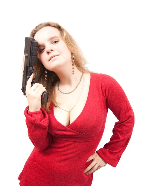 Жінка в червоній сукні з пістолетом — стокове фото
