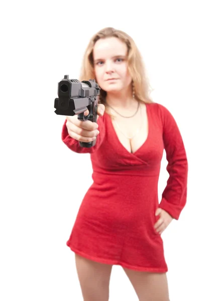 Дівчина з пістолетом. Зосередьтеся лише на зброї — стокове фото