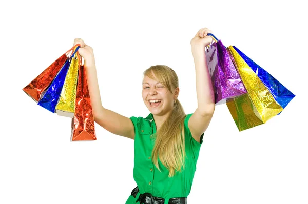 Boldog lány gazdaság bevásárló táskák — Stock Fotó