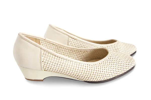 Isolierte beige weibliche Schuhe — Stockfoto