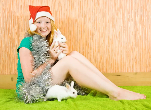 Girl with two pet rabbits — Stock Photo, Image