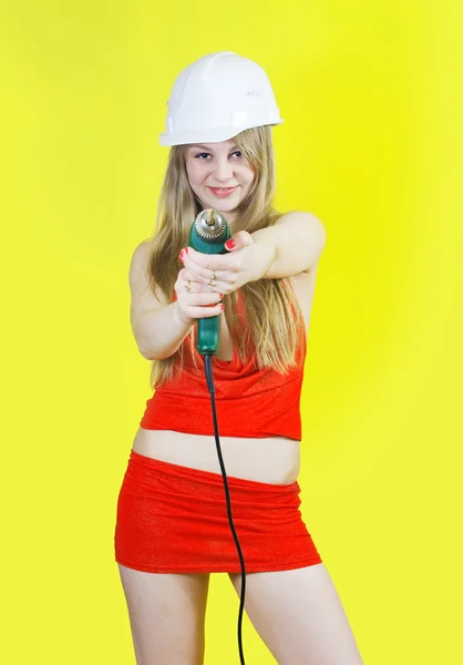 Sexy girl with drill — Stock Photo, Image