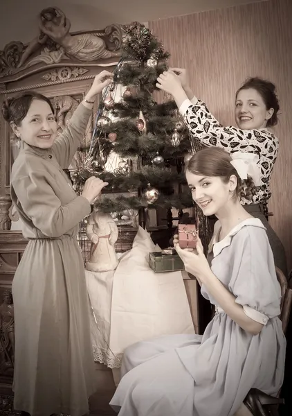 Vintage photo of Family decorating Christmas Stock Image