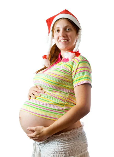 Беременная женщина в шляпе Санты — стоковое фото