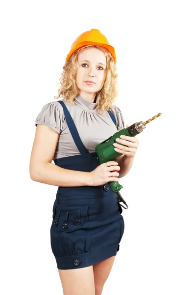 Girl in hard hat with dril — Stock Photo, Image
