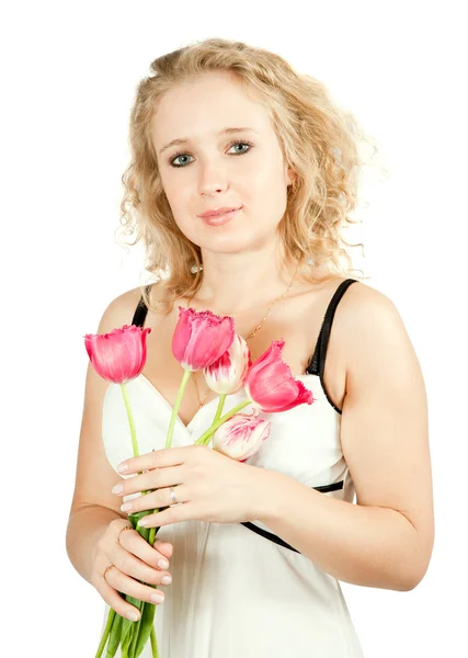 Frau mit Tulpenblumen — Stockfoto