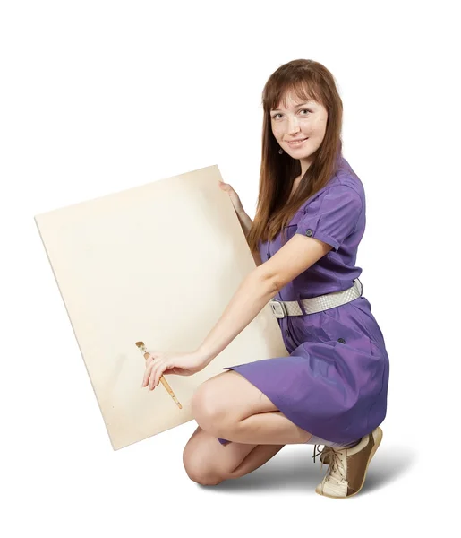 Dívka s kartáčem a prázdné plátno — Stock fotografie