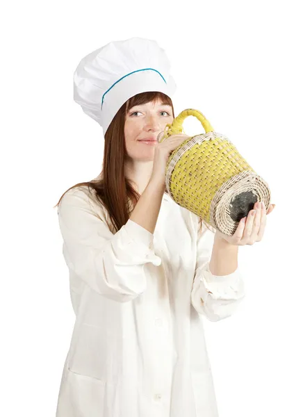 Cook žena s lahví — Stock fotografie