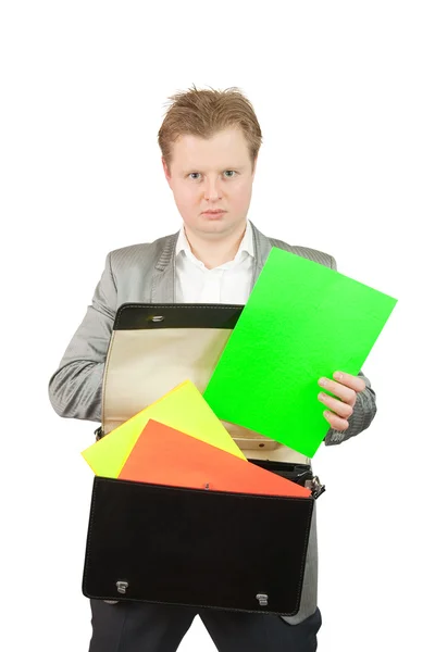 Businessman holds blank green poster — Stock Photo, Image