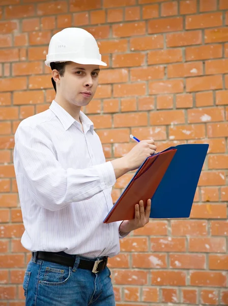 Construtor com documentos — Fotografia de Stock