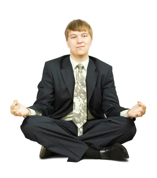 Businessman in yoga lotus pose — Stock Photo, Image